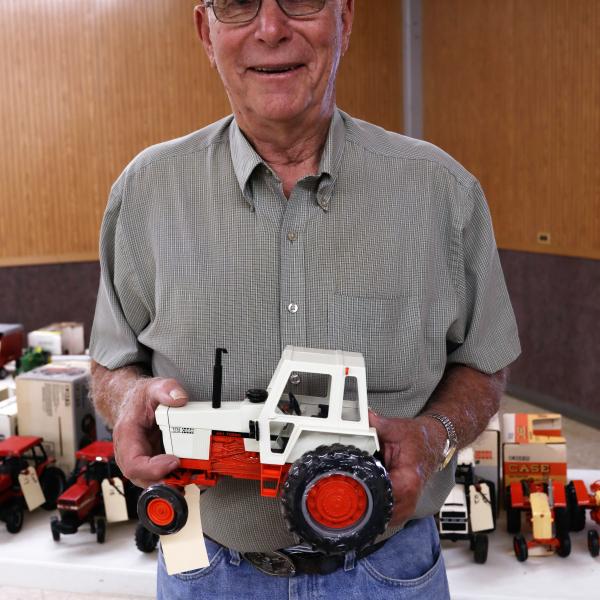 Norm Mortensen is pictured with one of his Case IH tractors